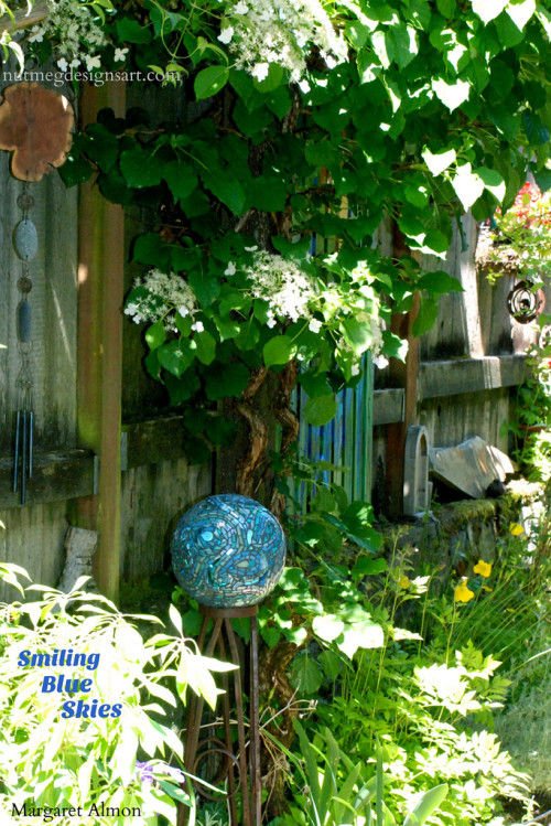 Smiling Blue Skies Mosaic Garden Ball by Margaret Almon