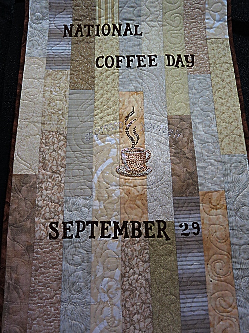 National Coffee Day Quilt by Bonnie Dwyer at the Pennsylvania Quilt Extravaganza, 2014. Photo by Wayne Stratz.