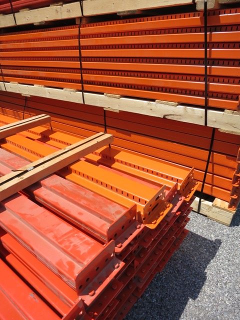 Orange Shelving Waiting to Be Installed at Warner Glass