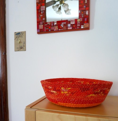 Basket by Margaret DeCook. Mosaic Mirror by Margaret Almon.