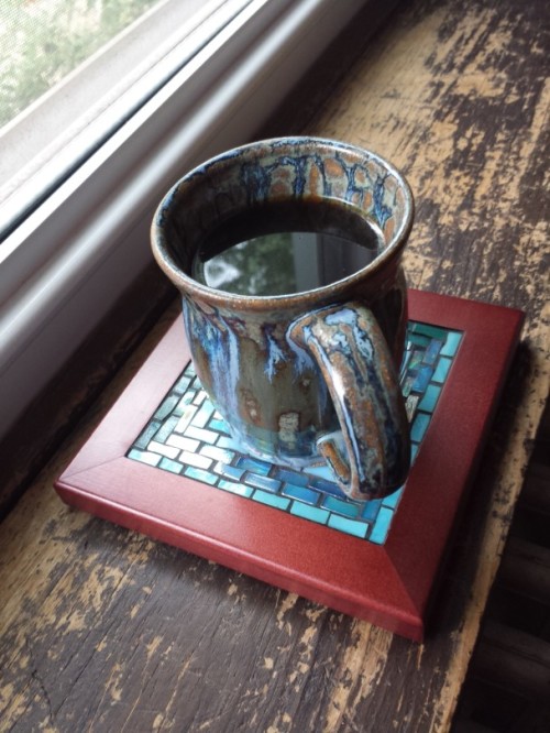 Peaceful Pleasant Springs Pottery Mug of Coffee with Blue Green Mug Mat by Margaret Almon