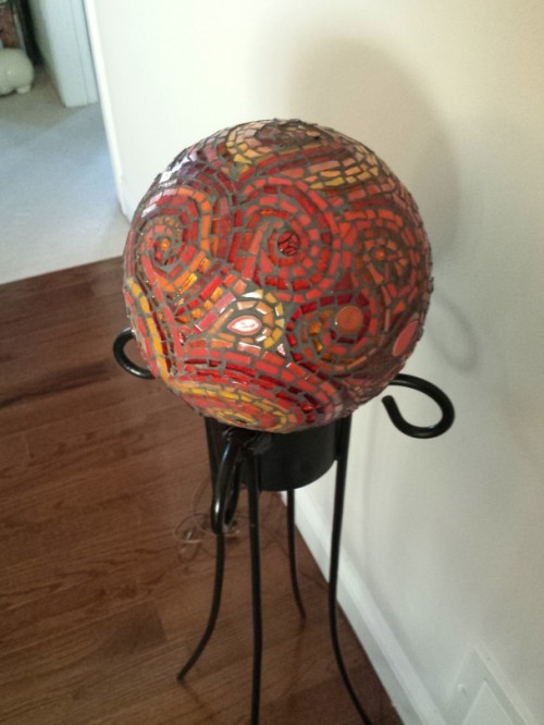 Orange and Red Paisley Bowling Ball by Margaret Almon