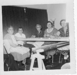 Helen Danner and her Quilting Group. (2nd from the right)